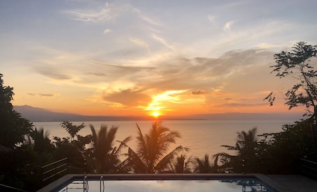 Outdoor pool. Masayahin Dive Center and Cabanavillas