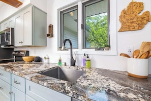 Fridge, microwave, oven, stovetop - Urban Gem: Mins to Beach & Downtown W/Hot tub! (Traverse City)