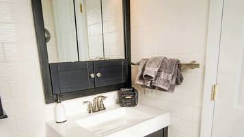 Shower, hair dryer, shampoo