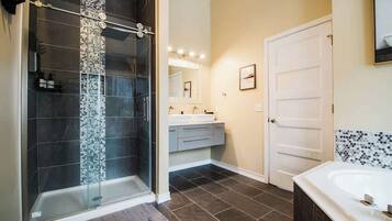 Shower, hair dryer, towels, shampoo