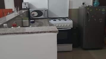 Fridge, microwave, cookware/dishes/utensils