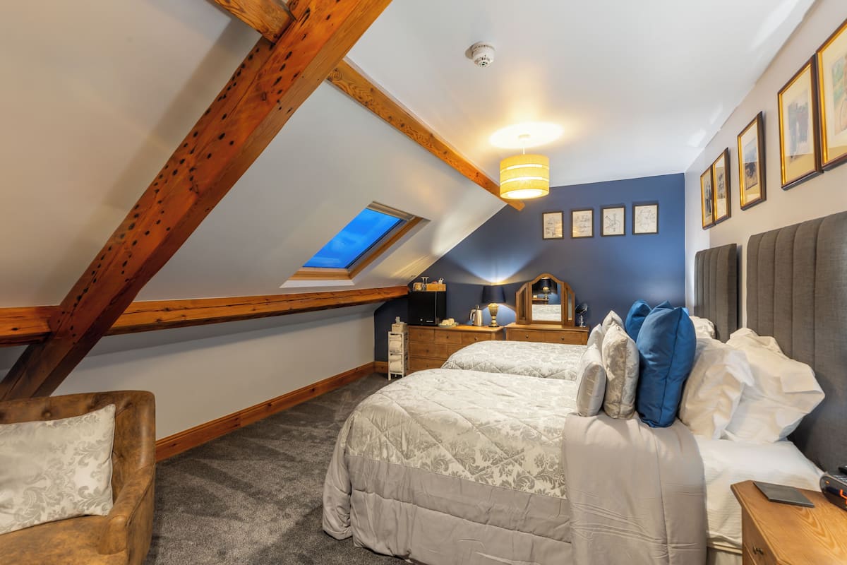 Standaard vierpersoonskamer, 2 slaapkamers | Luxe beddengoed, individueel gedecoreerd, individueel gemeubileerd