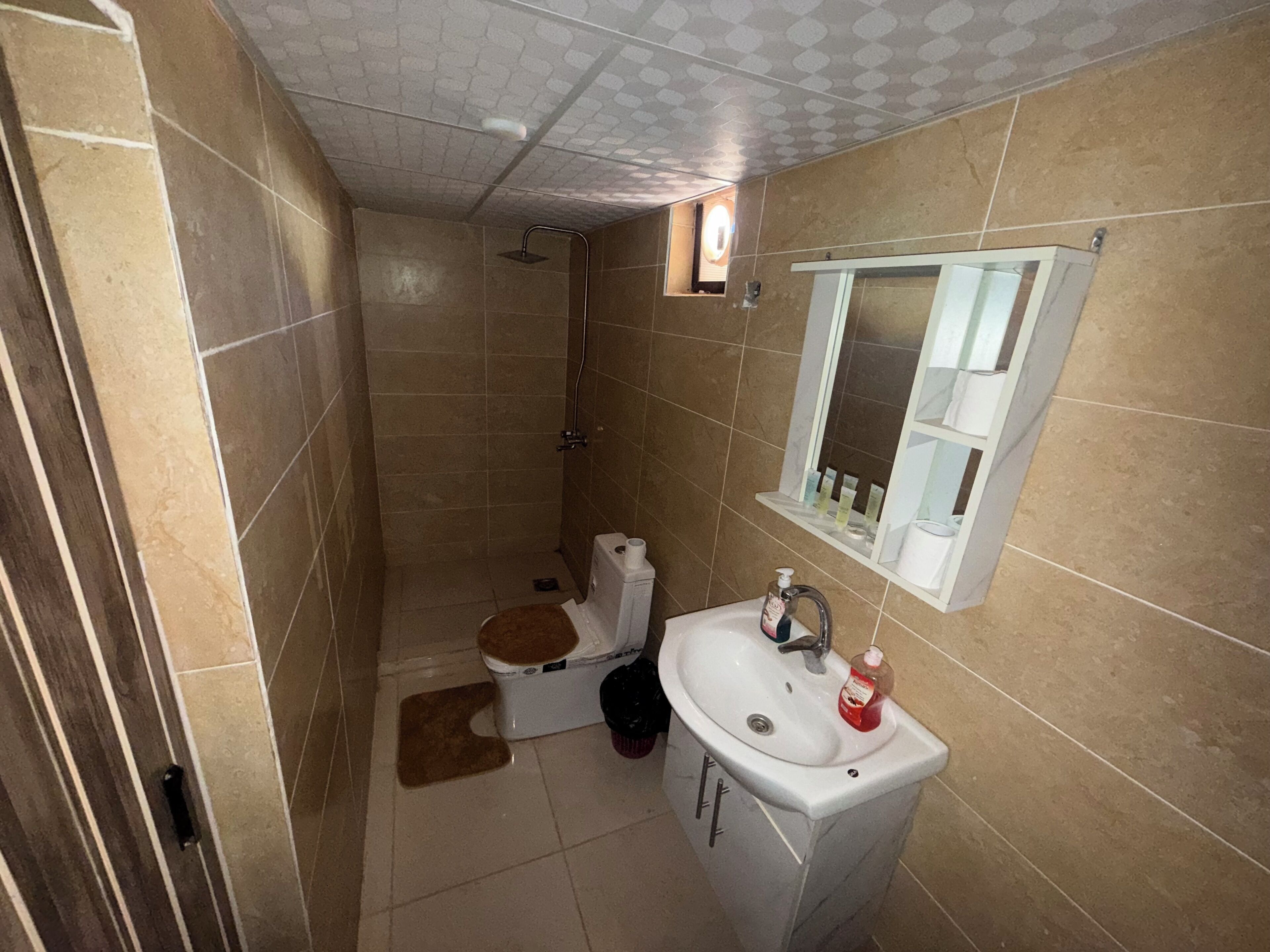 Rainfall showerhead, soap, toilet paper