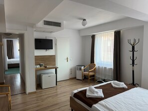 อพาร์ทเมนท์สำหรับครอบครัว | มินิบาร์, Wi-Fi ฟรี, ผ้าปูที่นอน