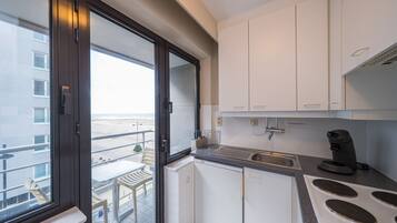 Microwave, oven, coffee/tea maker, cookware/dishes/utensils