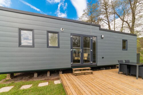Mobil-home spacieux avec terrasse à Erezée