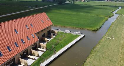 Two adjacent luxury villas in Friesland