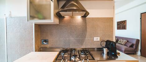 Fridge, microwave, stovetop, coffee/tea maker