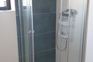 Hair dryer, towels, soap, shampoo