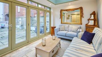 TV, fireplace, books