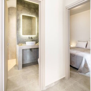 Shower, eco-friendly toiletries, hair dryer, towels