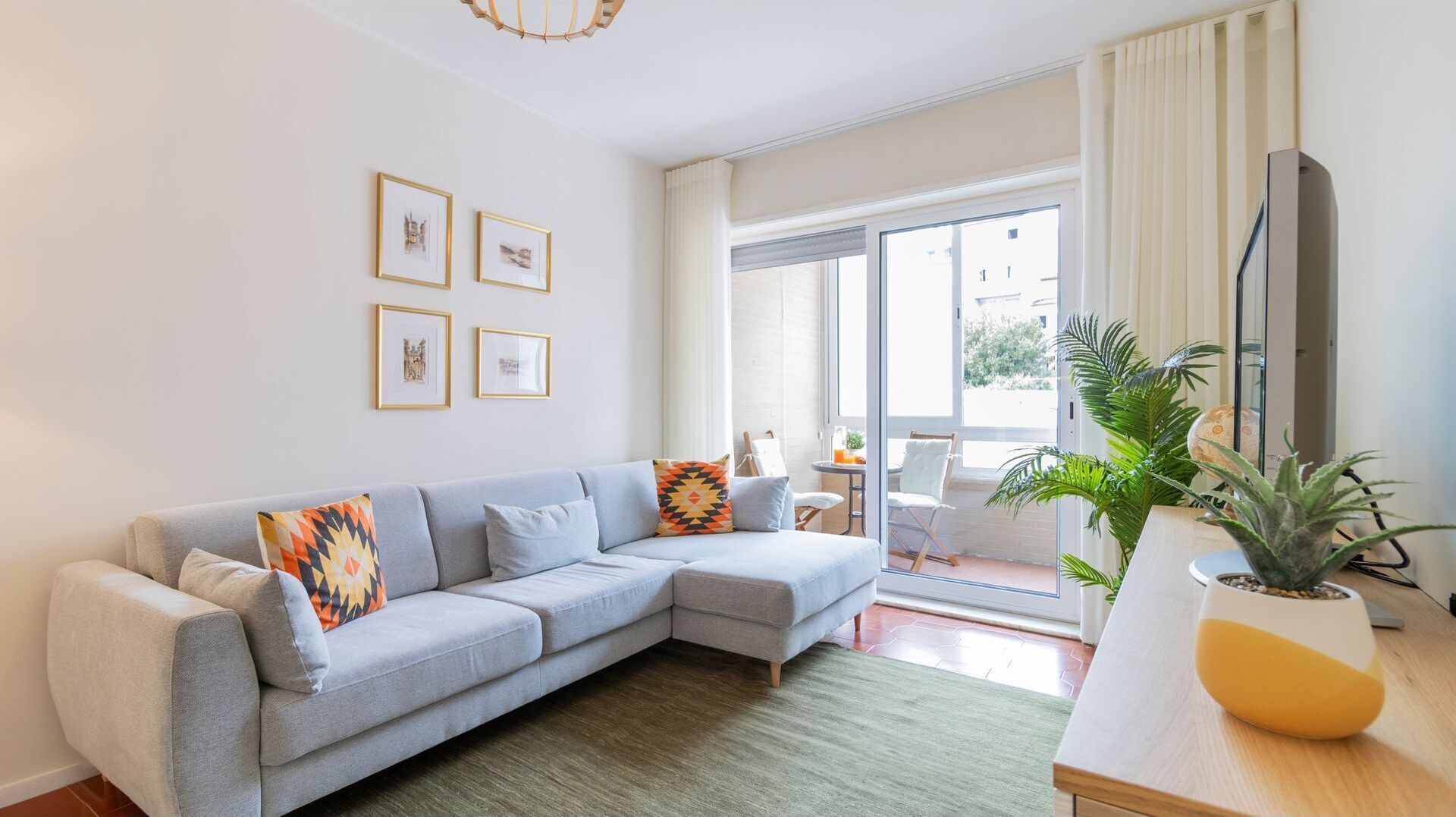 The bright and inviting living room offers a comfortable L-shaped sofa, perfect for relaxing after a day of exploration.
#LivingRoom #ComfortableStay #LovelyStay