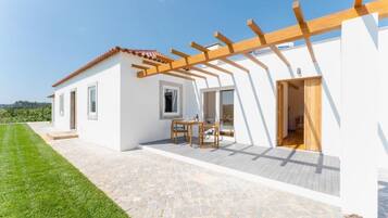 Deluxe Room, Garden View, Garden Area | Terrace/patio