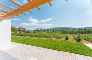 Deluxe Room, Garden View, Garden Area | Terrace/patio