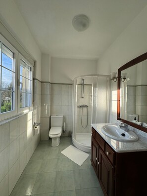 Shower, eco-friendly toiletries, hair dryer, bidet