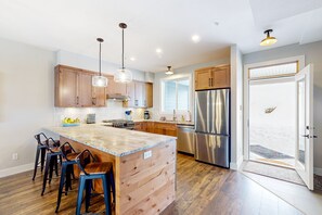 Fridge, microwave, oven, stovetop - Ski-In dog-friendly mountain duplex - with private hot tub & fireplace (White Mountain)