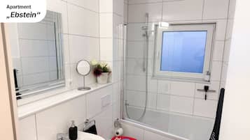 Hair dryer, towels, soap, shampoo