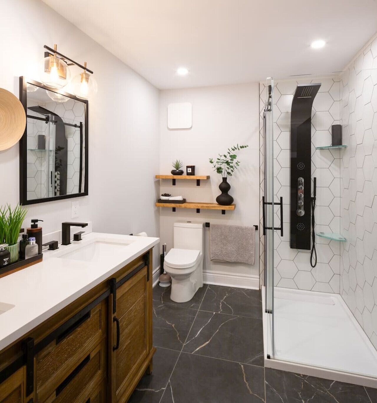 Shower, hair dryer, towels, toilet paper