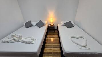 2 habitaciones, wifi gratis y ropa de cama