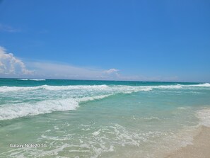 A beach with clear turquoise water and a clear sky. - Clean, Spacious. Newly renovated Garden Home in the heart of Pensacola.  (Pensacola)