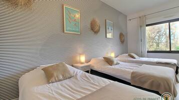 2 dormitorios, tabla de planchar con plancha, wifi gratis y ropa de cama