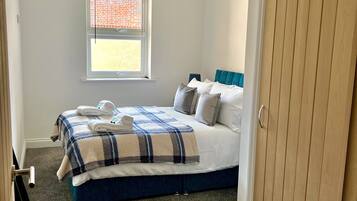 Apartemen | 2 kamar tidur, setrika/meja setrika, Wi-Fi gratis, dan seprai linen