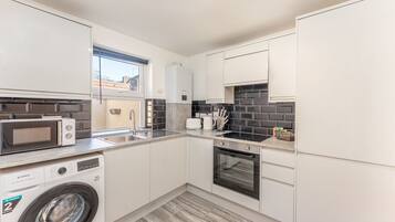 Apartment | Private kitchen | Fridge, microwave, oven, stovetop