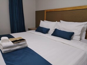 ห้องจูเนียร์สวีท | เครื่องนอนป้องกันสารก่อภูมิแพ้, ตู้นิรภัยในห้องพัก