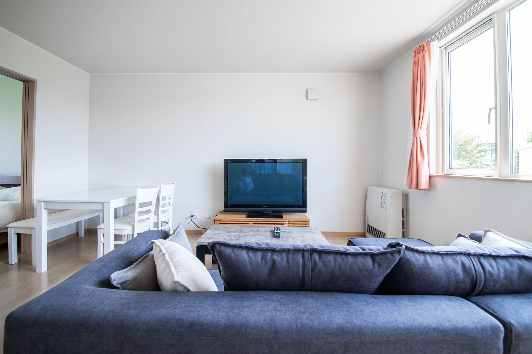 Basic Apartment | Living area | Flat-screen TV