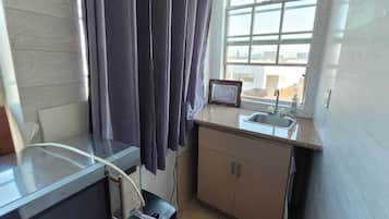 Microwave, stovetop, coffee/tea maker, toaster