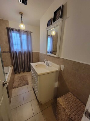 Jetted bath, hair dryer, towels, soap