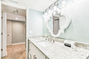 Shower, hair dryer, towels, toilet paper