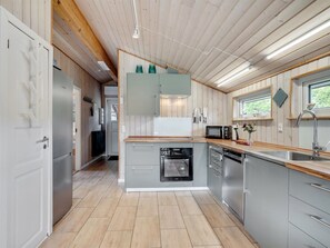 Fridge, microwave, dishwasher, cookware/dishes/utensils