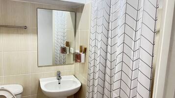 Hair dryer, towels, soap, toilet paper