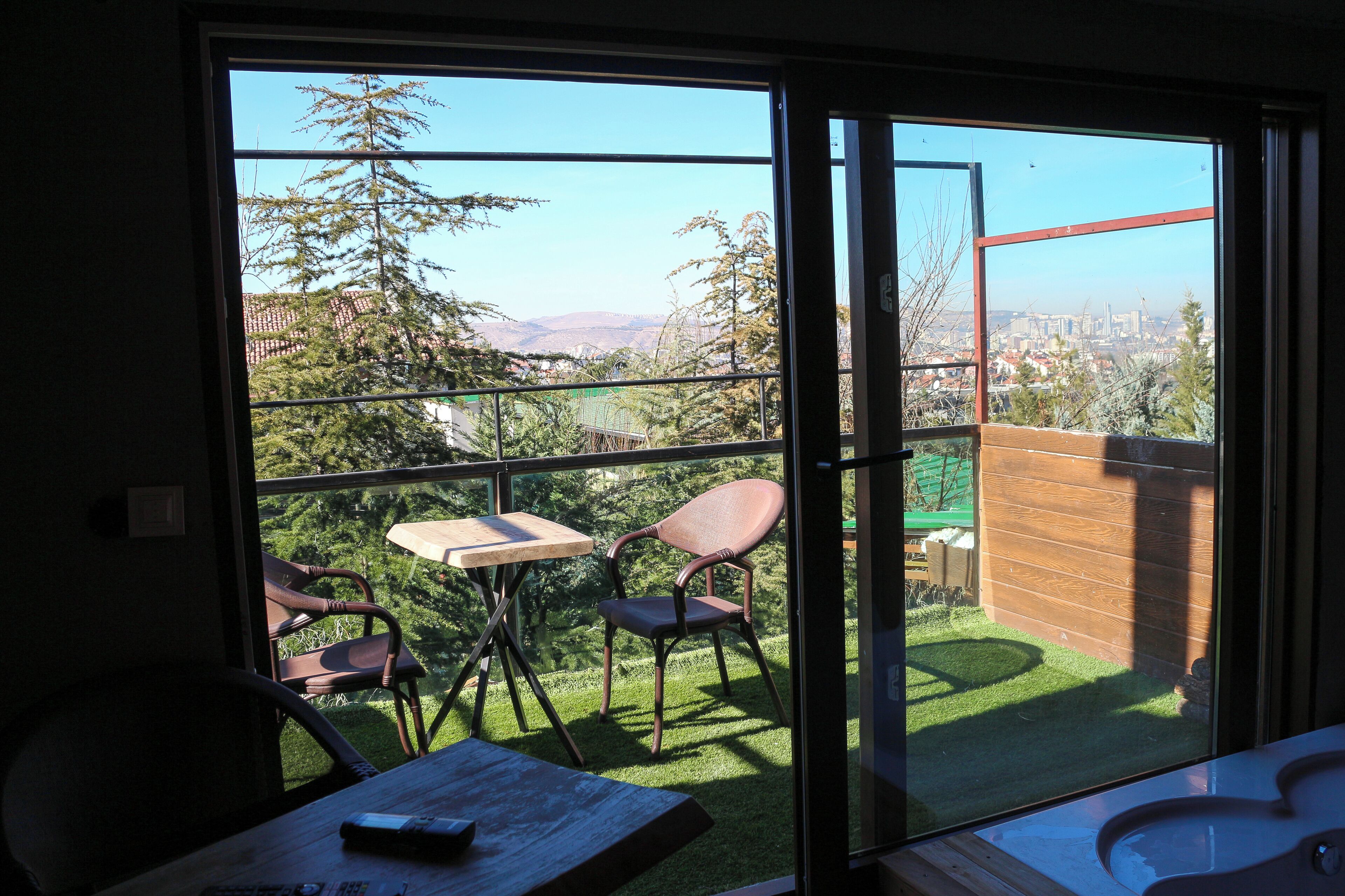 Comfort huisje, uitzicht op tuin | Terras