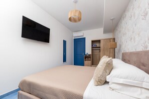 Habitación doble Deluxe | Ropa de cama hipoalergénica y edredón 