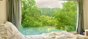 Tinyhouse Minimalus mit Panorama Schlafloft im Grünen mit Outdoordusche