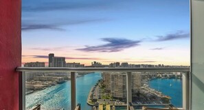 A cityscape with a marina and buildings. - Spectacular Apt: Amazing Pools + Gym (Hallandale Beach)