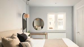 1 habitación, tabla de planchar con plancha, cuna de viaje y wifi