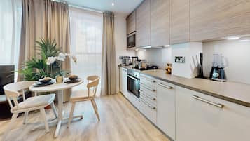 Fridge, microwave, oven, dining tables