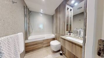 Hair dryer, towels, soap, toilet paper