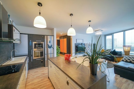 Slavic Spacious Apartment by CHORS | Private kitchen | Full-size fridge, microwave, oven, stovetop