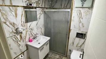 Apartment | Bathroom | Free toiletries, hair dryer, bathrobes, slippers