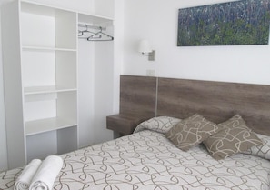 Basic trippelrum | Minibar, gratis wi-fi och sängkläder