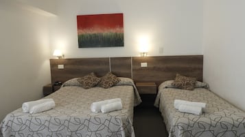 Basic Quadruple Room | Minibar, free WiFi, bed sheets