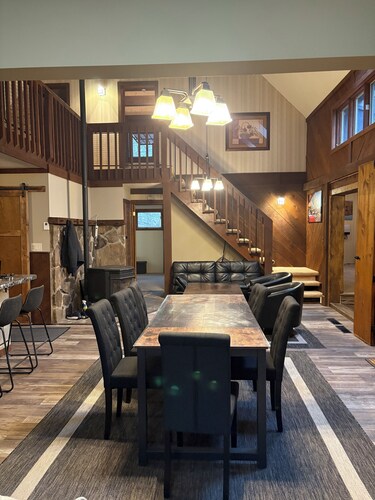 This dramatic home Located inside THE HIDEOUT offers a unique layout