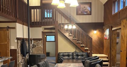 This dramatic home Located inside THE HIDEOUT offers a unique layout