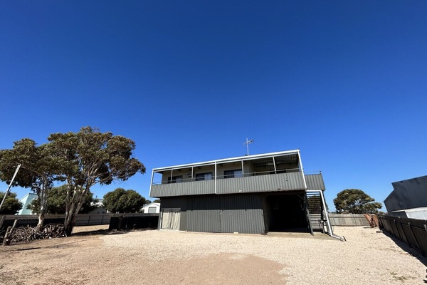 External Home with Large Parking Area