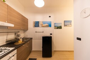 Fridge, oven, electric kettle, cookware/dishes/utensils