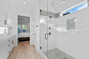 Shower, hair dryer, towels, toilet paper
